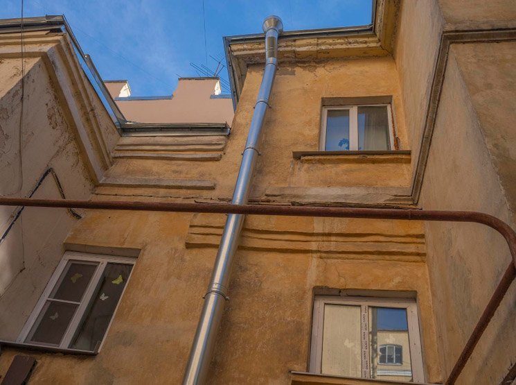 Cambio de bajantes para comunidades de vecinos en España Precio de retirar canalones de uralita en España